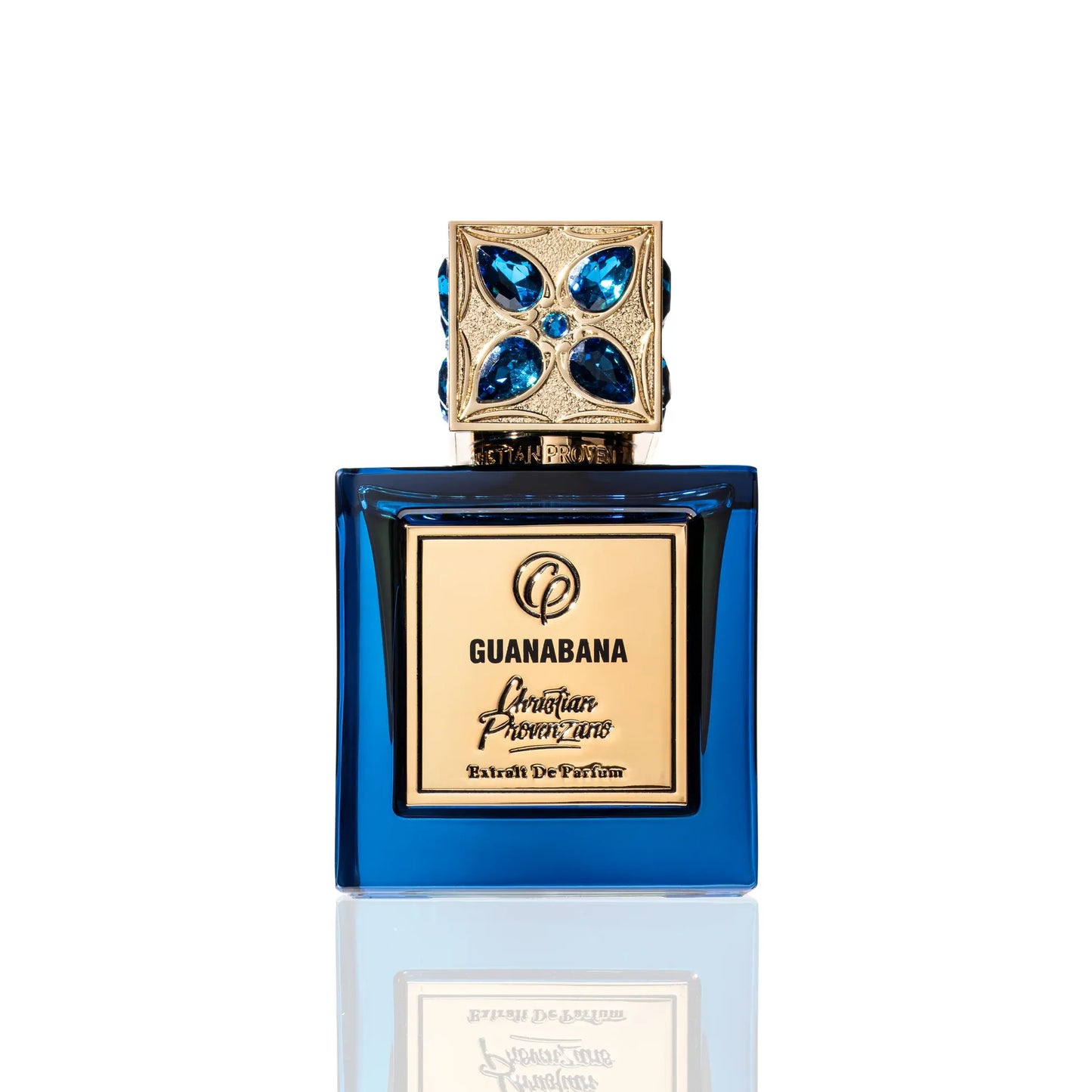 Blue perfume bottle with decorative cap on a white background