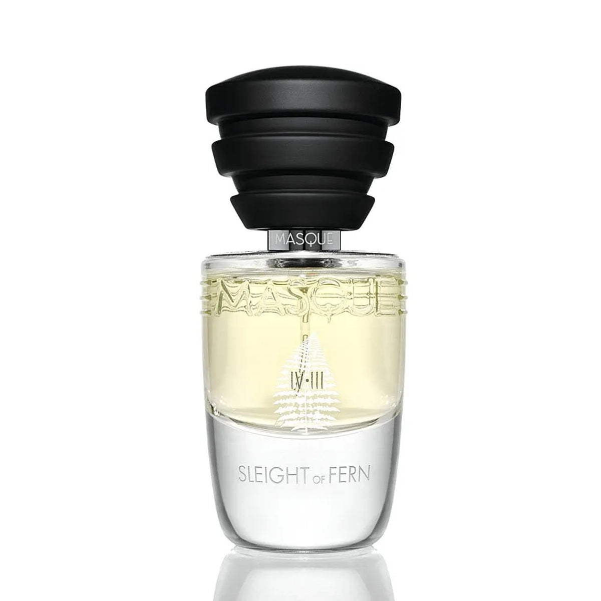 Perfume bottle labeled 'Sleight of Fern' with a black cap on a white background by Masque Milano